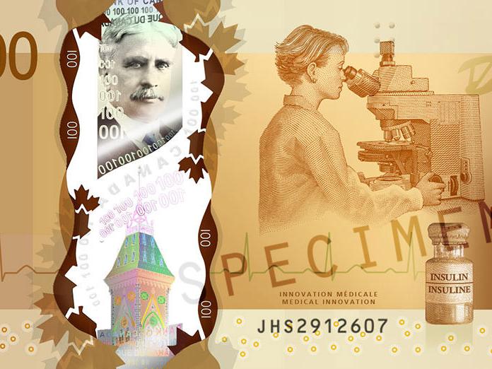 Pohľad zblízka na kanadskú 100-dolárovú bankovku, na ktorej je okrem iného zobrazený mikroskop ZEISS.