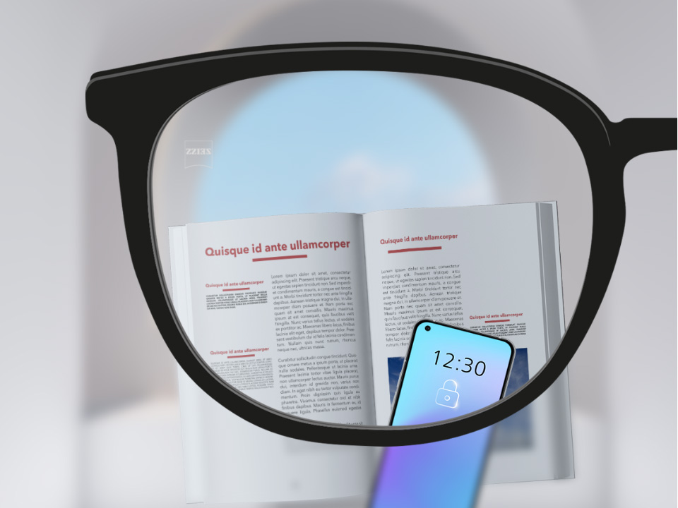 Obrázok zorného uhla so šošovkami ZEISS Single Vision SmartLife so smartfónom a knihou a šošovkou, ktorá je úplne jasná.